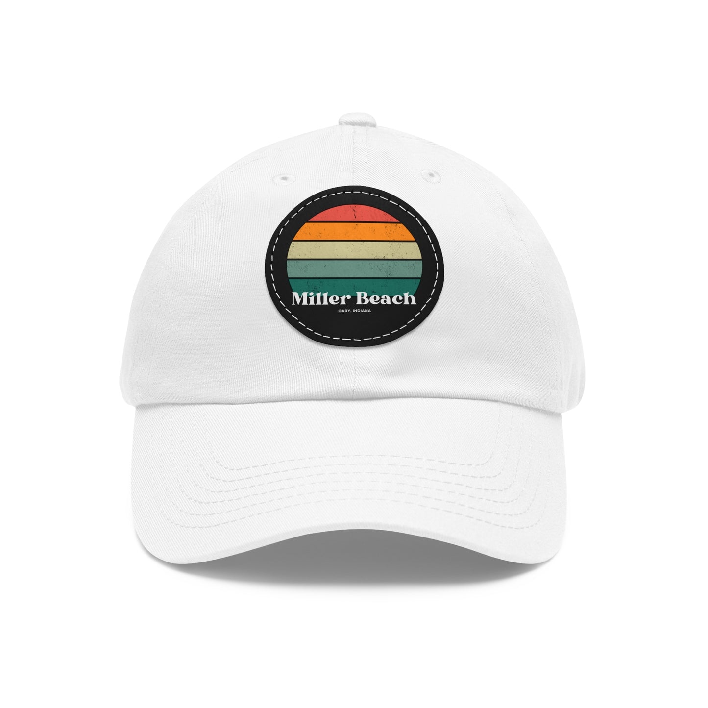 The Miller Beach Retro Sunset - Dad Hat with Leather Patch (Round) by Printify is a pink baseball cap crafted from bio-washed chino twill for added comfort. It features a PU leather patch adorned with horizontal stripes in red, orange, yellow, green, and blue. Below the stripes, "Miller Beach" is embroidered in white. An adjustable strap at the back ensures a perfect fit.