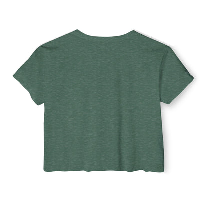 The Pontic Trans Am - Women's Festival Crop Top by Printify is a green heathered crop top featuring a large, stylized yellow eagle graphic with wings spread wide on the front, reminiscent of the Pontiac Phoenix Trans Am logo. With a simple crew neck and short sleeves, this top is ideal for vintage enthusiasts.