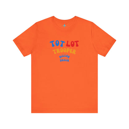 A green unisex jersey short sleeve tee from Printify, featuring colorful text on the front that reads "TOT LOT TROOPER MILLER BEACH" in blue, red, yellow, and orange letters. The shirt is displayed against a plain white background.