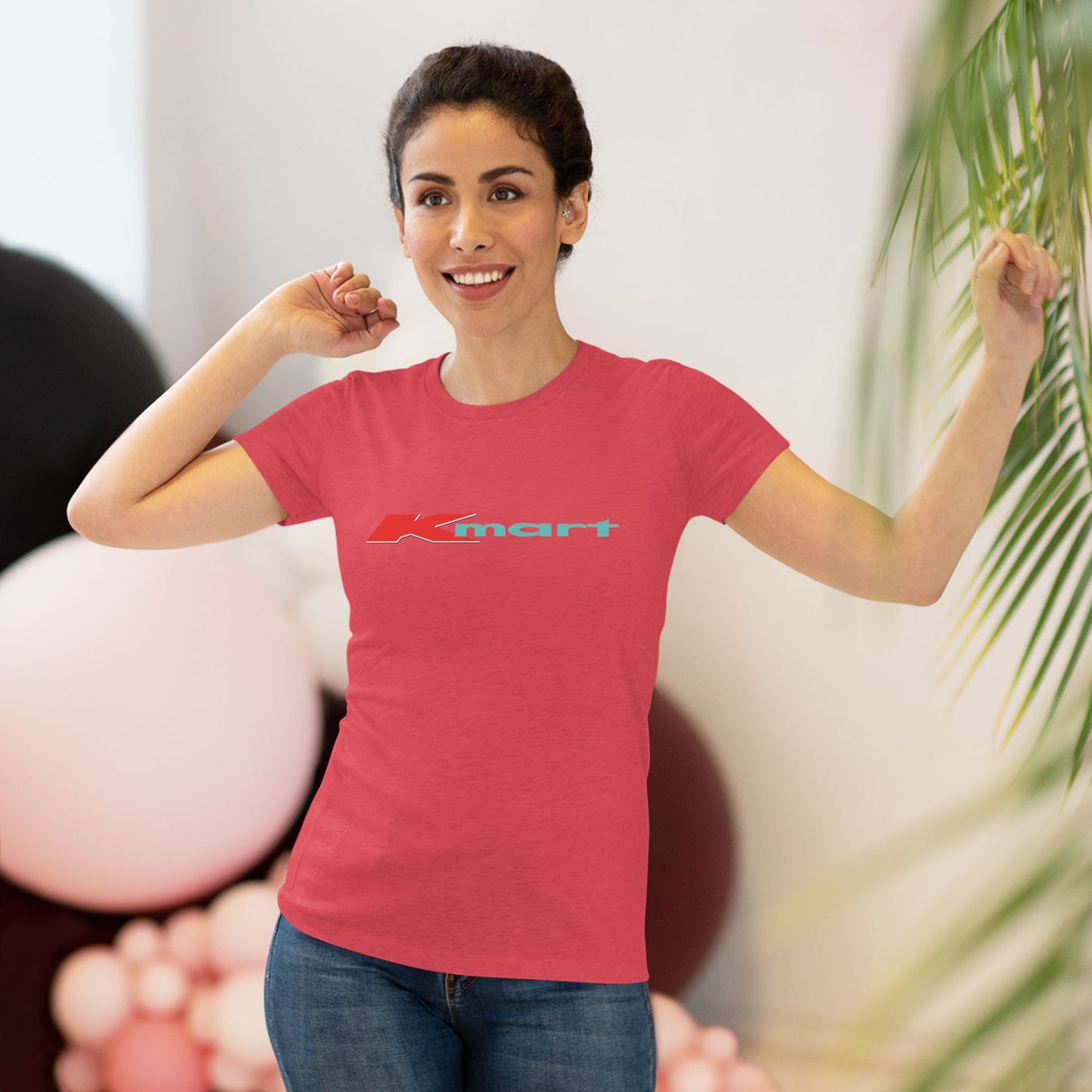 A women's triblend tee by Printify in light gray, featuring a casual and minimalist design that captures the essence of vintage style with a centered 1980s Retro Kmart logo on the front.