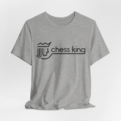 A unisex jersey short sleeve tee from Printify, featuring the Chess King 1980's Clothing Store Logo with a black, stylized king chess piece and the words "Chess King" on a blue background, reminiscent of retro 80s fashion.