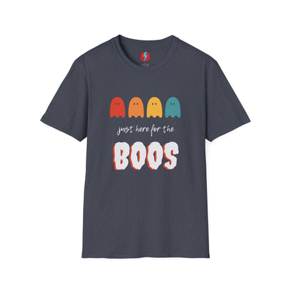 The "Just Here for the Boos - Halloween - Unisex Softstyle T-Shirt" by Printify is a blue, unisex tee with a playful Halloween theme. It features four ghost icons in red, orange, yellow, and green, followed by the text "just here for the BOOS" with "BOOS" styled in a bold and spooky font. Perfect for embracing the spooky season!