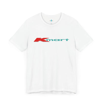 The Printify KMart Logo 1980s Retro - Unisex Jersey Short Sleeve Tee in dark gray features a nostalgic design with the iconic logo in red and teal across the chest. This short-sleeve crew-neck shirt exudes vintage charm with its simple, classic look.