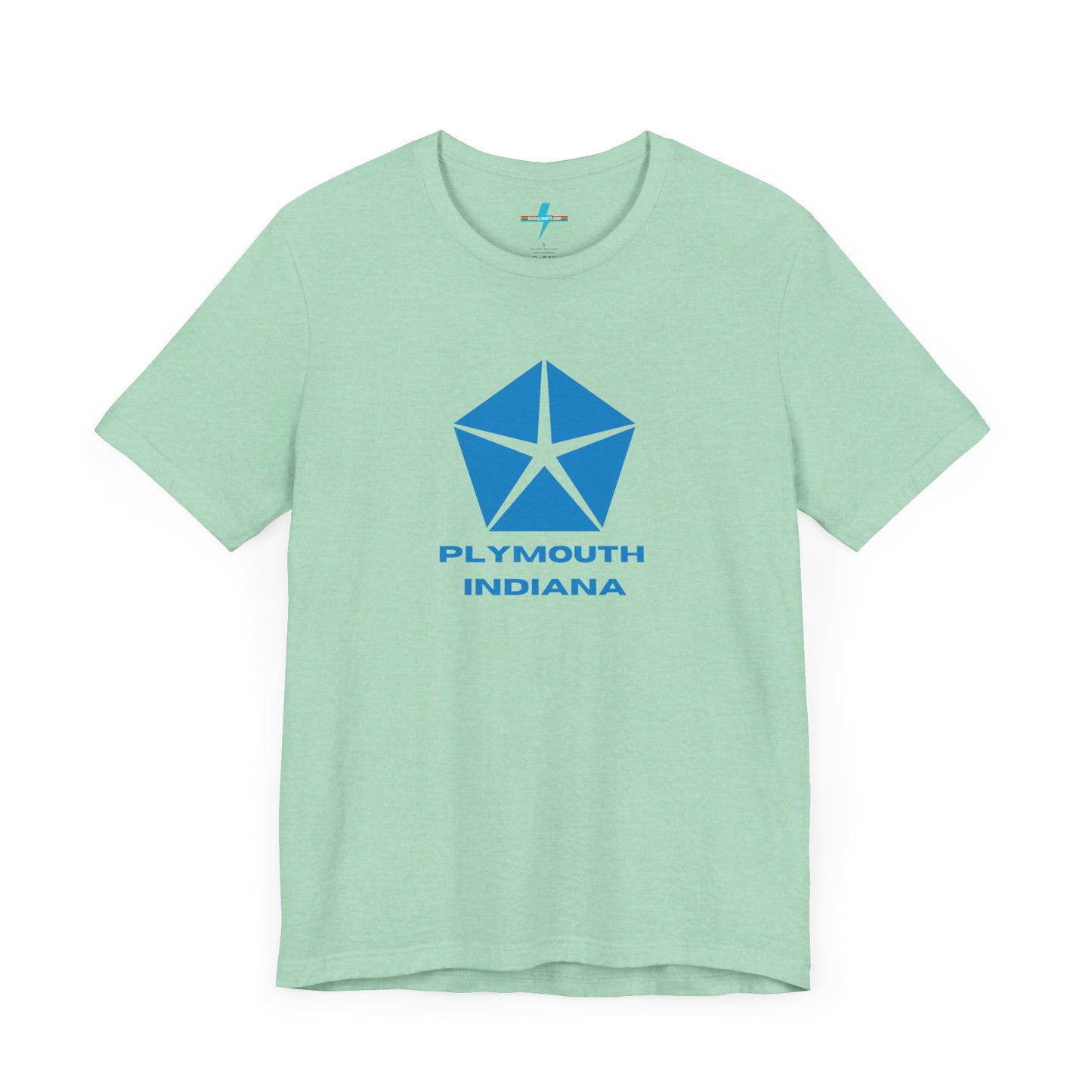 A black Printify Plymouth, Indiana Chrysler Logo T-shirt is displayed against a plain white background. The shirt features a blue, five-point star emblem reminiscent of a vintage autos design above the text "PLYMOUTH INDIANA" in blue, centered across the front. The shirt is laid out flat with the sleeves slightly bent.