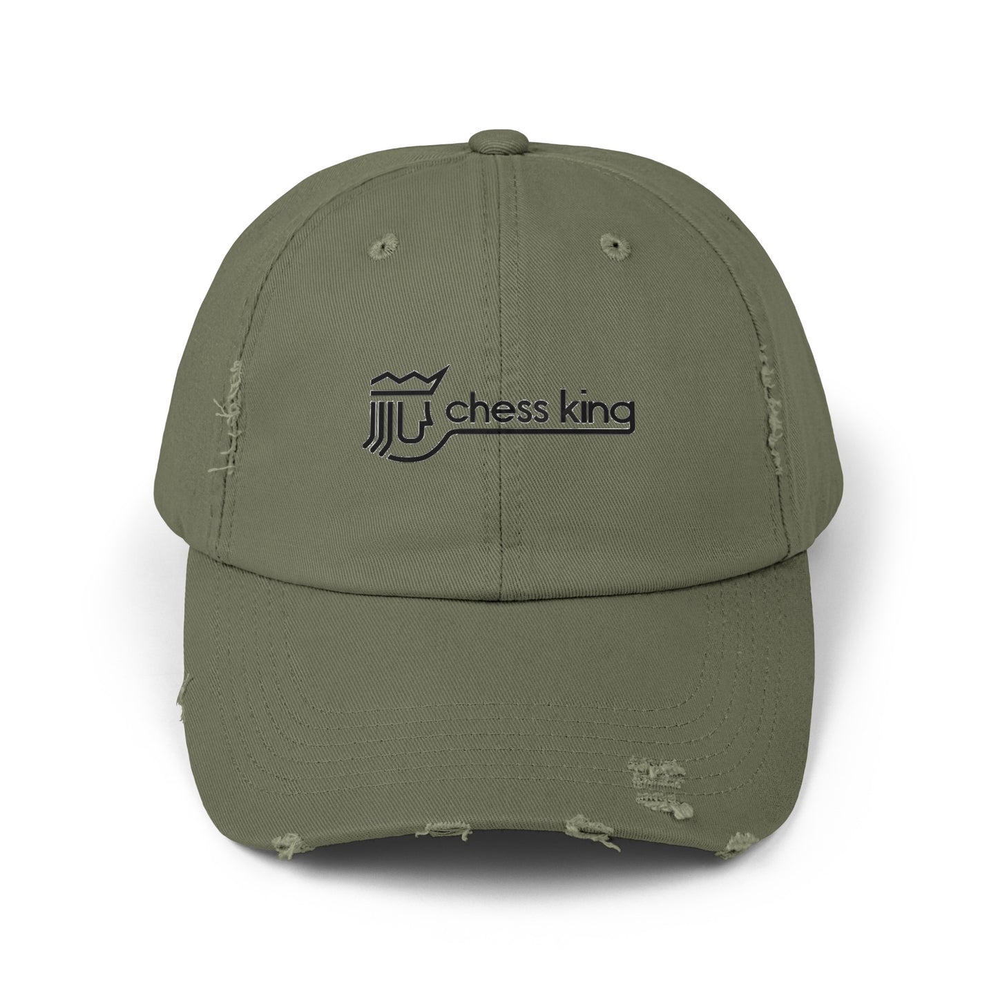 The 1980s Chess King Clothing Store Logo - Unisex Distressed Cap by Printify is a beige baseball cap made from 100% cotton twill. It features intentional distress details and a logo with a crown and rook piece, along with the text "chess king" embroidered on the front, making it a stylish choice for custom caps enthusiasts.