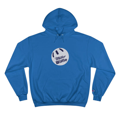 A navy blue Printify Miller Beach Wiffle Ball OG Logo - Sweatshirt, featuring a white wiffle ball graphic on the chest with "Miller Wiffle" in blue beneath it. Made from recycled polyester, this hoodie includes a front pocket, drawstrings, and the Champion logo on the left sleeve. It also offers Double Dry® technology for added comfort.