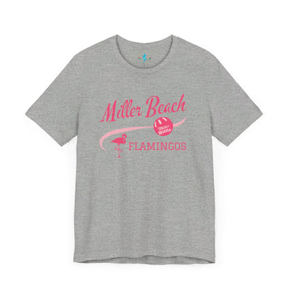 Printify offers the Miller Beach Flamingos WWBC - Unisex Jersey Short Sleeve Tee, featuring a light pink T-Shirt adorned with "Miller Beach Flamingos" and a volleyball graphic in pink. This design also includes an illustration of a flamingo, celebrating their participation in the World Wiffel Ball Championship. The shirt is showcased against a minimalist, white backdrop.