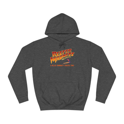 Introducing the "Reefer Madness - A Miller Community Theatre Joint" hoodie by Printify—a green hoodie with "Reefer Madness The Musical" displayed in bold, colorful font. Beneath it, the phrase "A very scary trip!" is featured. This hoodie is ideal for fans of the Miller Community Theatre production and comes with a front pocket and a drawstring hood.