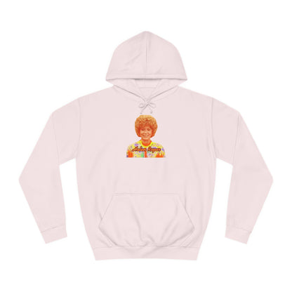 This Helen Roper - Three's Company unisex hoodie by Printify features a lively graphic of a woman with curly hair in a vibrant, patterned outfit. The elegantly scripted text "Mother Rogers" beneath her adds a vintage fashion flair to any wardrobe.