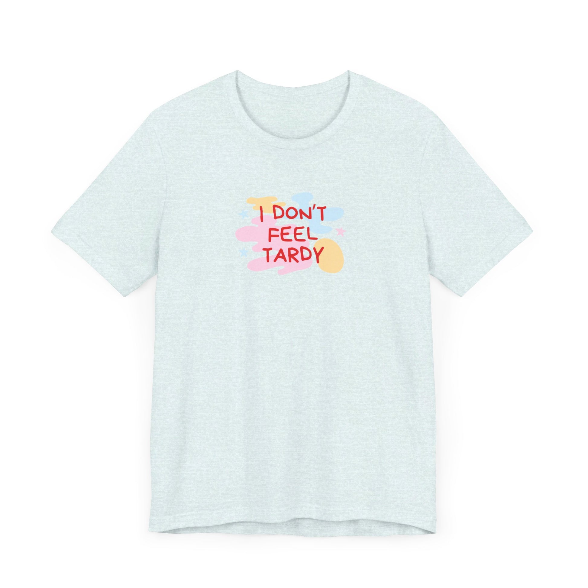 The "I Don't Feel Tardy - 1980s Retro - Unisex Jersey Short Sleeve Tee" from Printify is a light pink jersey shirt that features the bold, colorful text "I DON'T FEEL TARDY" prominently at its center. This design exudes retro vibes with small star shapes and abstract splashes of blue, yellow, and pink, laid flat against a plain background to channel pure Van Halen T-shirt energy.