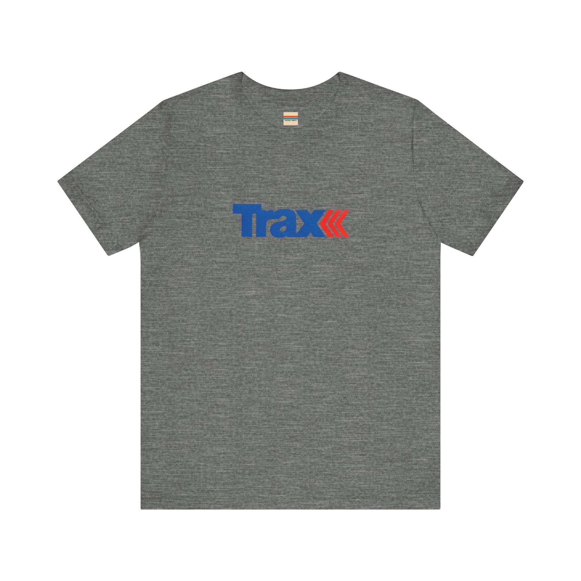 A gray unisex jersey short sleeve tee from Printify, inspired by retro 1980s Kmart style. The "Trax" logo is printed in blue letters, followed by three red arrows pointing to the right. This classic Trax Brand T-shirt is laid flat against a white background, capturing nostalgic fashion vibes.