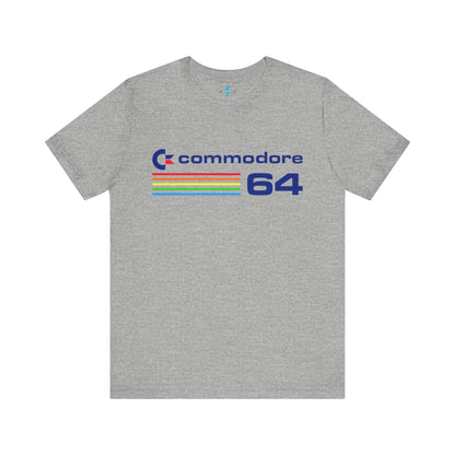 The 1980s Commodore 64 Computer C64 Unisex Jersey Short Sleeve Tee from Printify features a green T-shirt adorned with a vintage design showcasing the text "Commodore 64" and multicolored horizontal lines next to it. The word "Commodore" is emblazoned in blue alongside the Commodore logo, while the number "64" is also highlighted in blue on the right. Ideal for any retro tech enthusiast, this shirt is displayed against a white background.