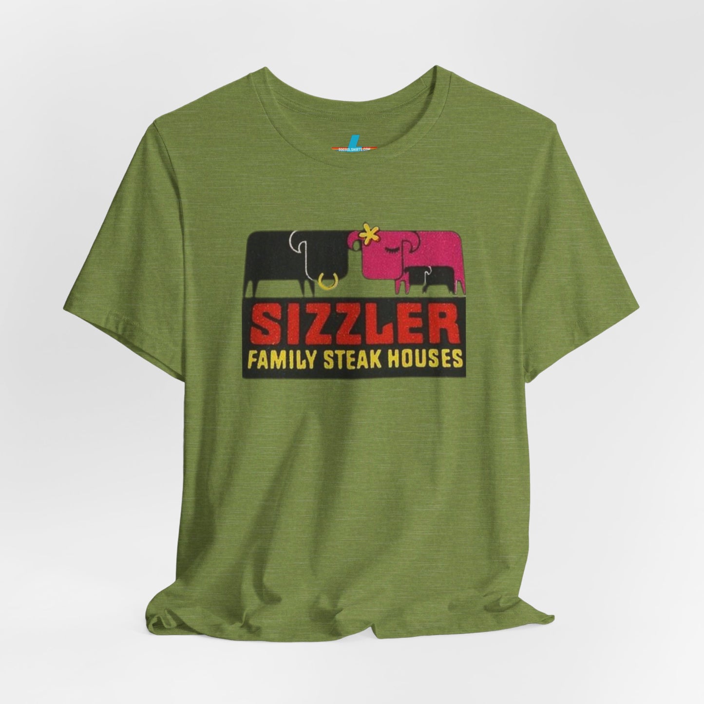 The "Sizzler Family Steakhouses - Retro 1981 Logo - Unisex Jersey Short Sleeve Tee" by Printify is a gray t-shirt showcasing a retro-style graphic with two black and pink cows, a cactus, and the text "Sizzler Family Steak Houses" in vibrant red and yellow. Ideal for any retro enthusiast, this design evokes nostalgia reminiscent of vintage restaurant logos from 1981.