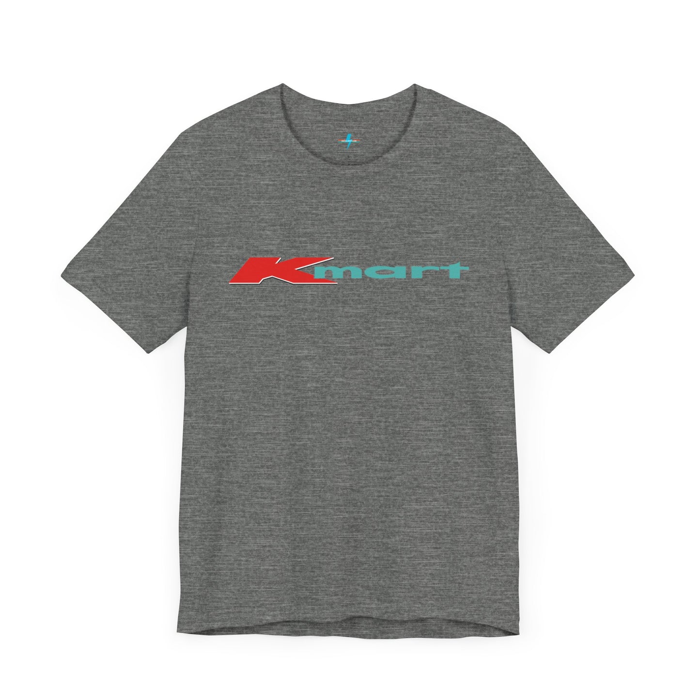 The Printify KMart Logo 1980s Retro - Unisex Jersey Short Sleeve Tee in dark gray features a nostalgic design with the iconic logo in red and teal across the chest. This short-sleeve crew-neck shirt exudes vintage charm with its simple, classic look.