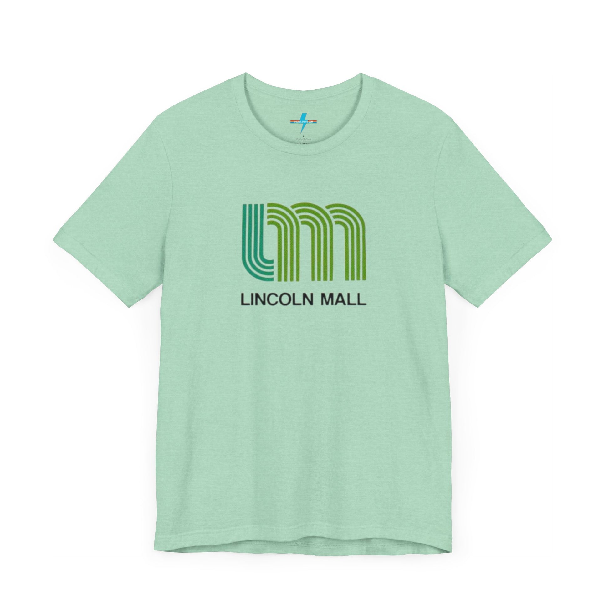 A light green unisex jersey short sleeve tee by Printify features "LINCOLN MALL" written under a retro-styled green and blue curved line design, celebrating the 70s and 80s shopping era in Lincoln Mall Matteson.