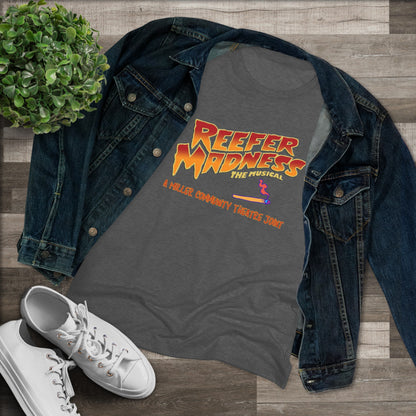 This limited-edition dark gray "Reefer Madness Cast Shirt - Miller Community Theatre - Women's Triblend Tee" by Printify features the text "Reefer Madness: The Musical" in bold, fiery letters across the chest. Below, in smaller orange text, it reads, "A Hill's Community Theatre Joint.