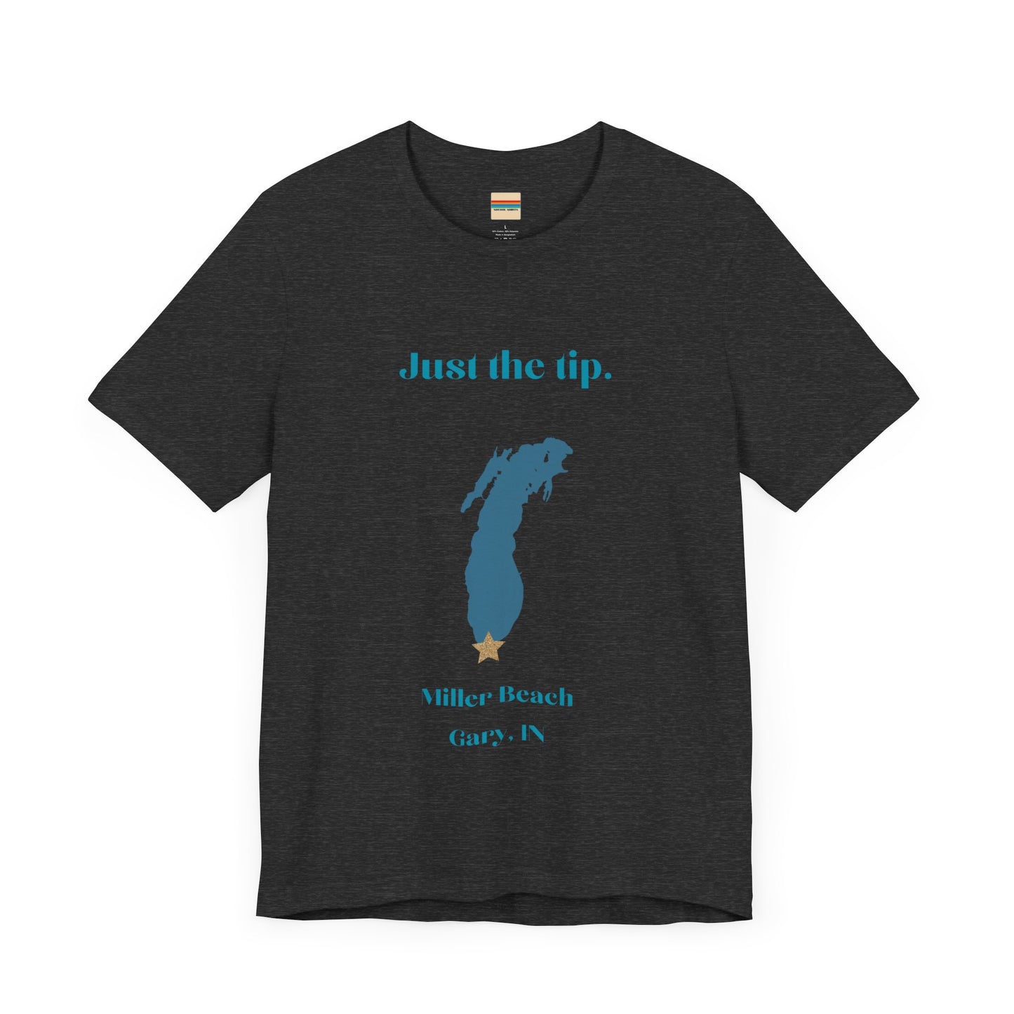 The Just the Tip - Miller Beach Unisex Jersey Short Sleeve Tee by Printify in yellow showcases text and a graphic design. The top displays "Just the tip" above a blue silhouette reminiscent of Indiana. At the bottom, it reads "Miller Beach" and "Gary, IN." Made from soft Airlume combed cotton, this tee offers both comfort and style.