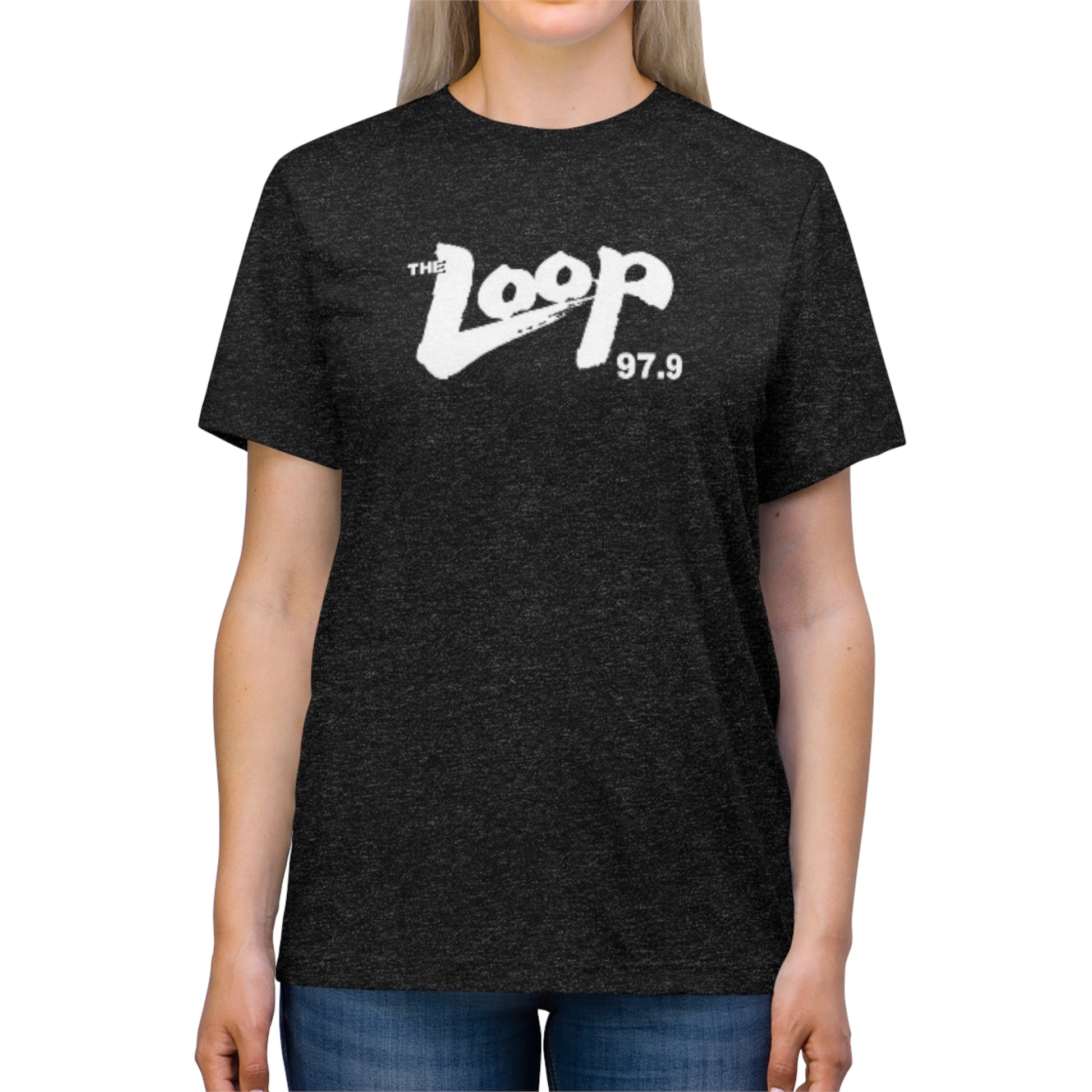 A plain grey Printify The Loop - Chicago - 97.9 Radio Unisex Triblend Tee with a white logo that says "The Loop 97.9" in a stylized font across the chest. The shirt has short sleeves and a round neckline, perfect for any classic rock fan.