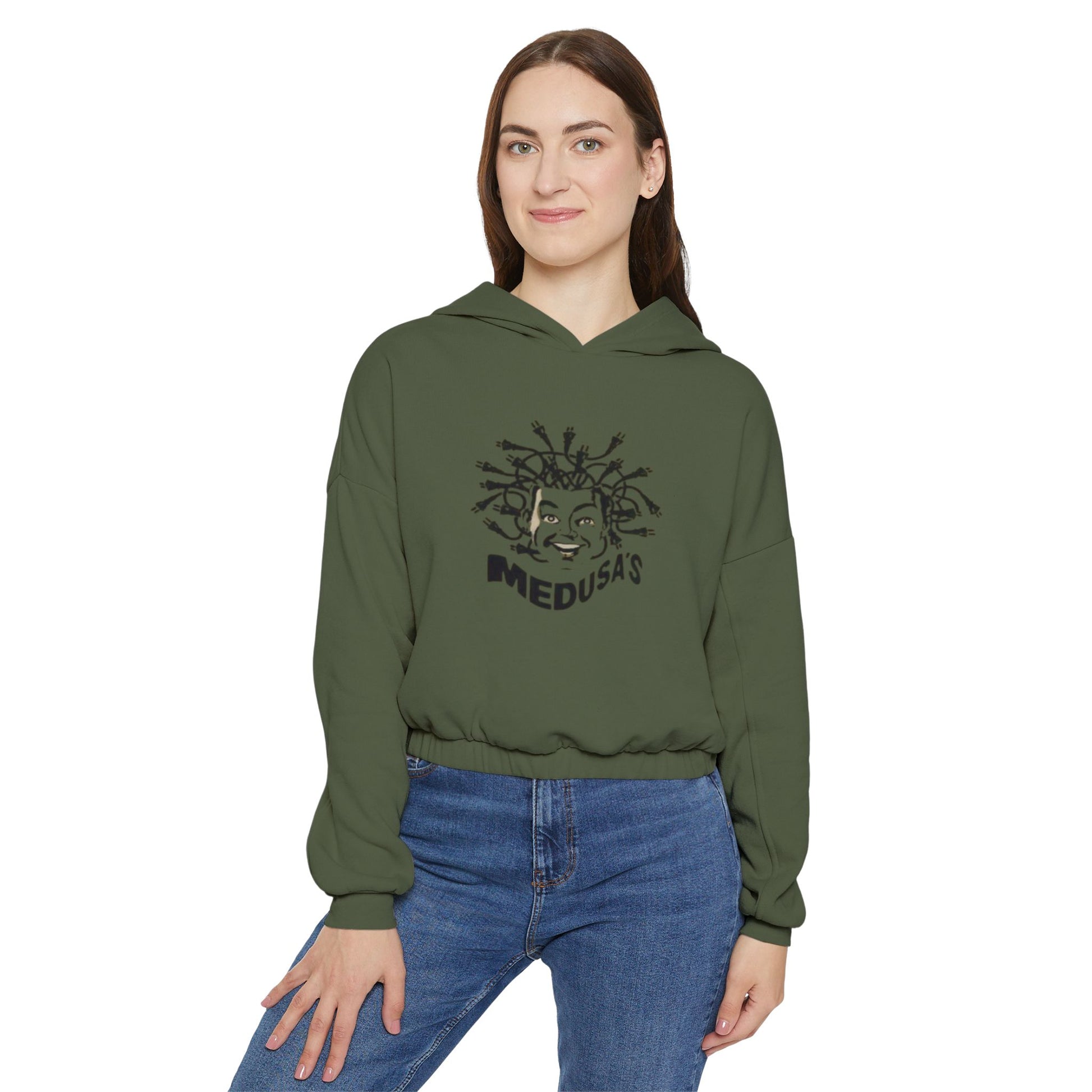 Get transported to the retro club scene with Printify's Medusa's 1980s Dance Club - Chicago Women's Cinched Bottom Hoodie in olive green. Featuring an eye-catching graphic of Medusa's head adorned with snake hair, this bold piece is completed with the words "Medusa’s Dance Club," making it a standout addition to any wardrobe.