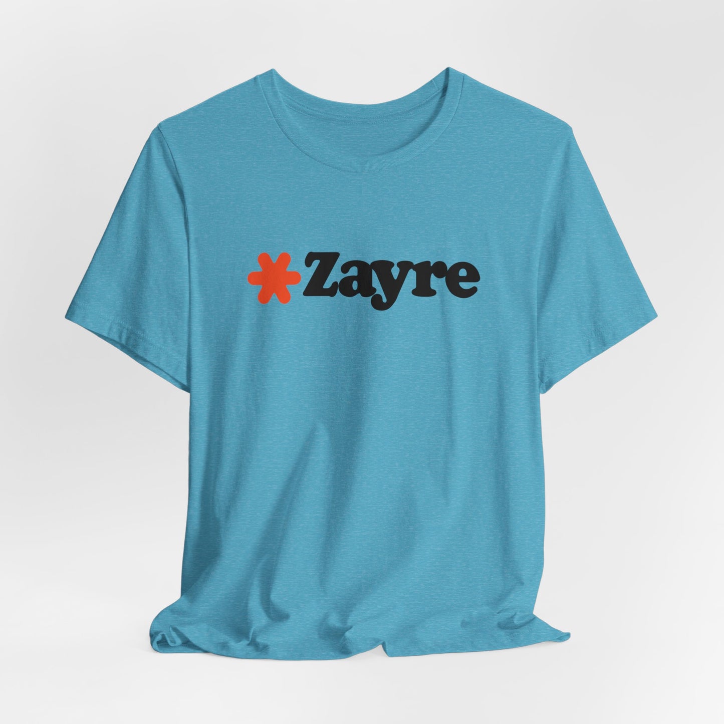 The Zayre Stores Logo - Retro 1980s Unisex Jersey Short Sleeve Tee by Printify features a gray design with the word "Zayre" printed in black letters and a red asterisk preceding the text. Reminiscent of retro fashion from the Zayre 1980s Retail Store, this shirt is displayed against a minimalistic white background and appears to be made of soft, comfortable fabric.