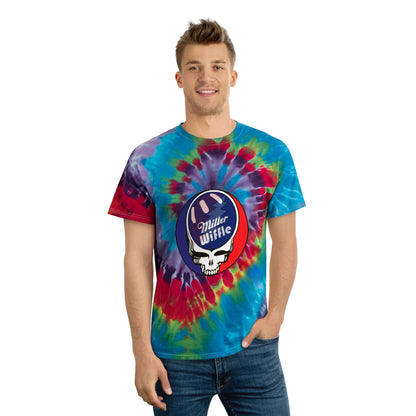 Introducing the Miller Wiffel Ball Stealy - Tie-Dye Tee, Spiral - Unisex by Printify. This vibrant tie-dye t-shirt features a swirl of blue, green, red, yellow, and purple colors in a classic spiral pattern. Made from 100% pre-shrunk cotton, it boasts a striking graphic at the center: a white skull wearing a baseball hat with the text "Miller Wiffle" on a red and blue background.