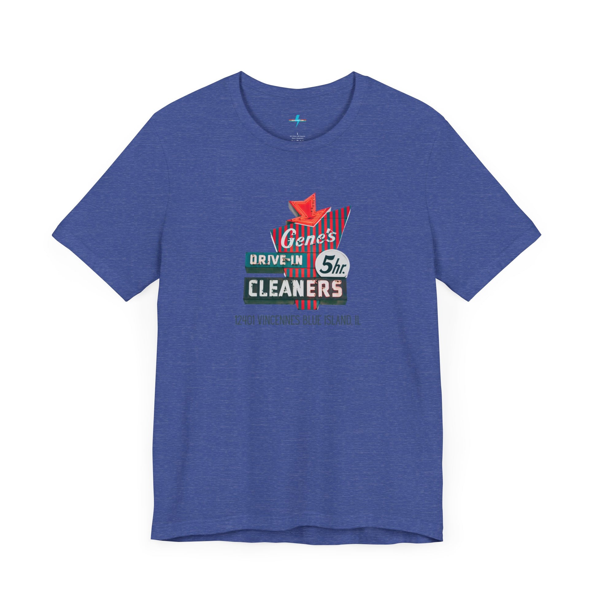 A unisex Jersey short sleeve tee from Printify featuring a light grey color with a retro-style graphic in the center. The design showcases text that reads "Gene's Drive In Cleaners, 5th," along with the address "12401 Vincennes Blue Island IL" in a blend of vintage fonts and colors, evoking the classic Chicago Fire-era vintage sign aesthetic.