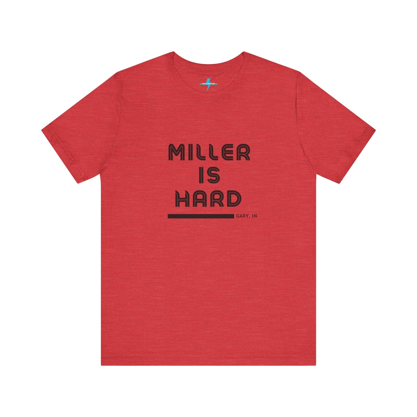 A unisex jersey short sleeve tee from Printify in burnt orange features the bold black text "MILLER IS HARD" on the chest, with "GARY, IN" written beneath in smaller black font. Perfect for showcasing Miller Beach's iconic spirit, this t-shirt is displayed against a plain white background.