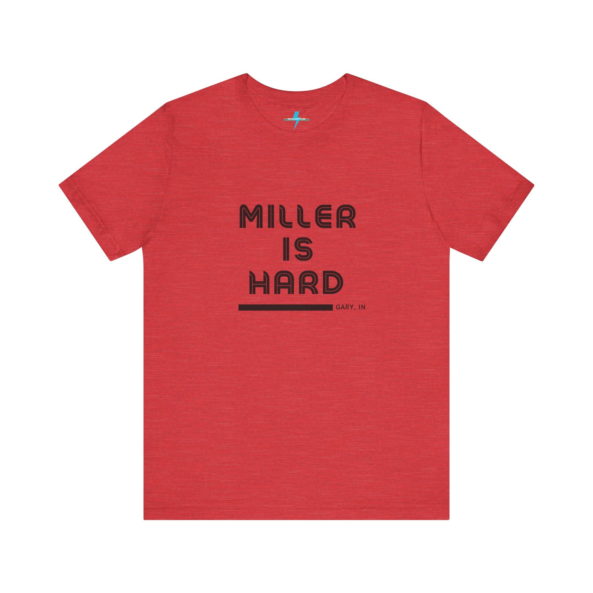 A unisex jersey short sleeve tee from Printify in burnt orange features the bold black text "MILLER IS HARD" on the chest, with "GARY, IN" written beneath in smaller black font. Perfect for showcasing Miller Beach's iconic spirit, this t-shirt is displayed against a plain white background.