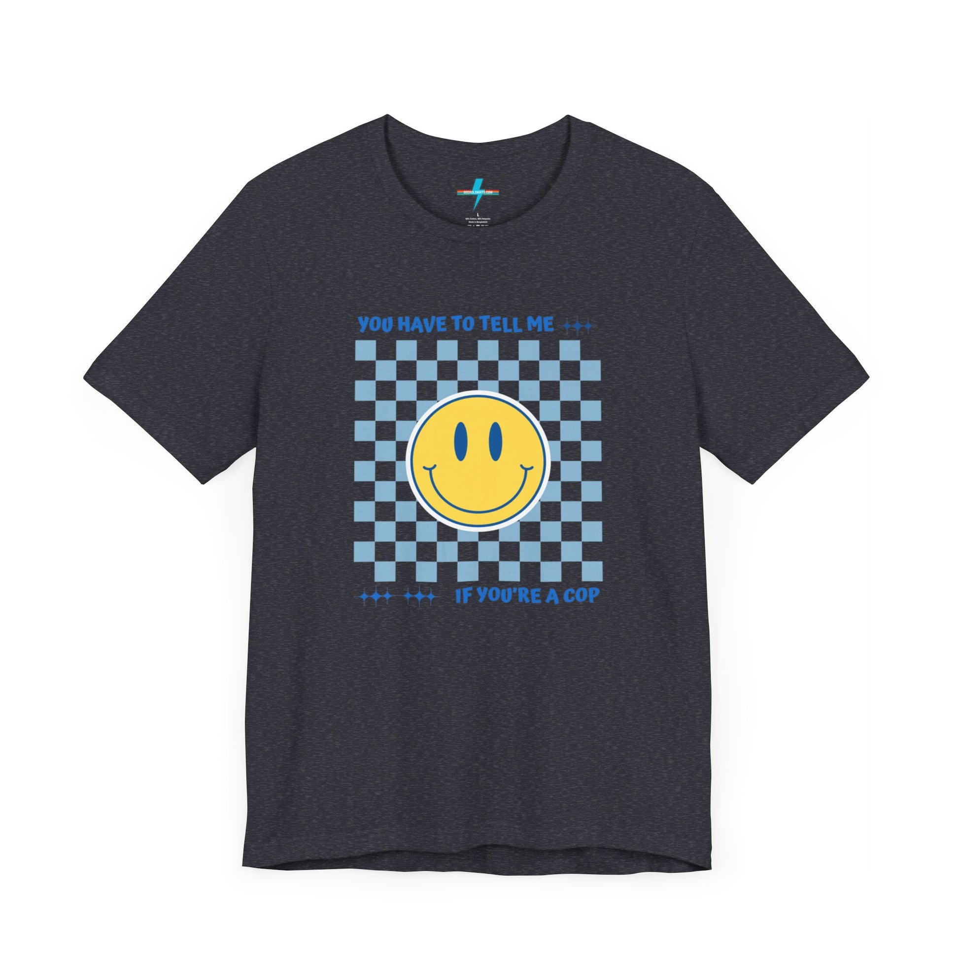 A light yellow unisex jersey short sleeve tee from Printify featuring a blue and yellow checkerboard pattern with a large yellow smiley face in the center. The shirt displays blue text above and below the pattern that reads, "You have to tell me if you're a cop." It's made from 100% Airlume combed and ring-spun cotton.