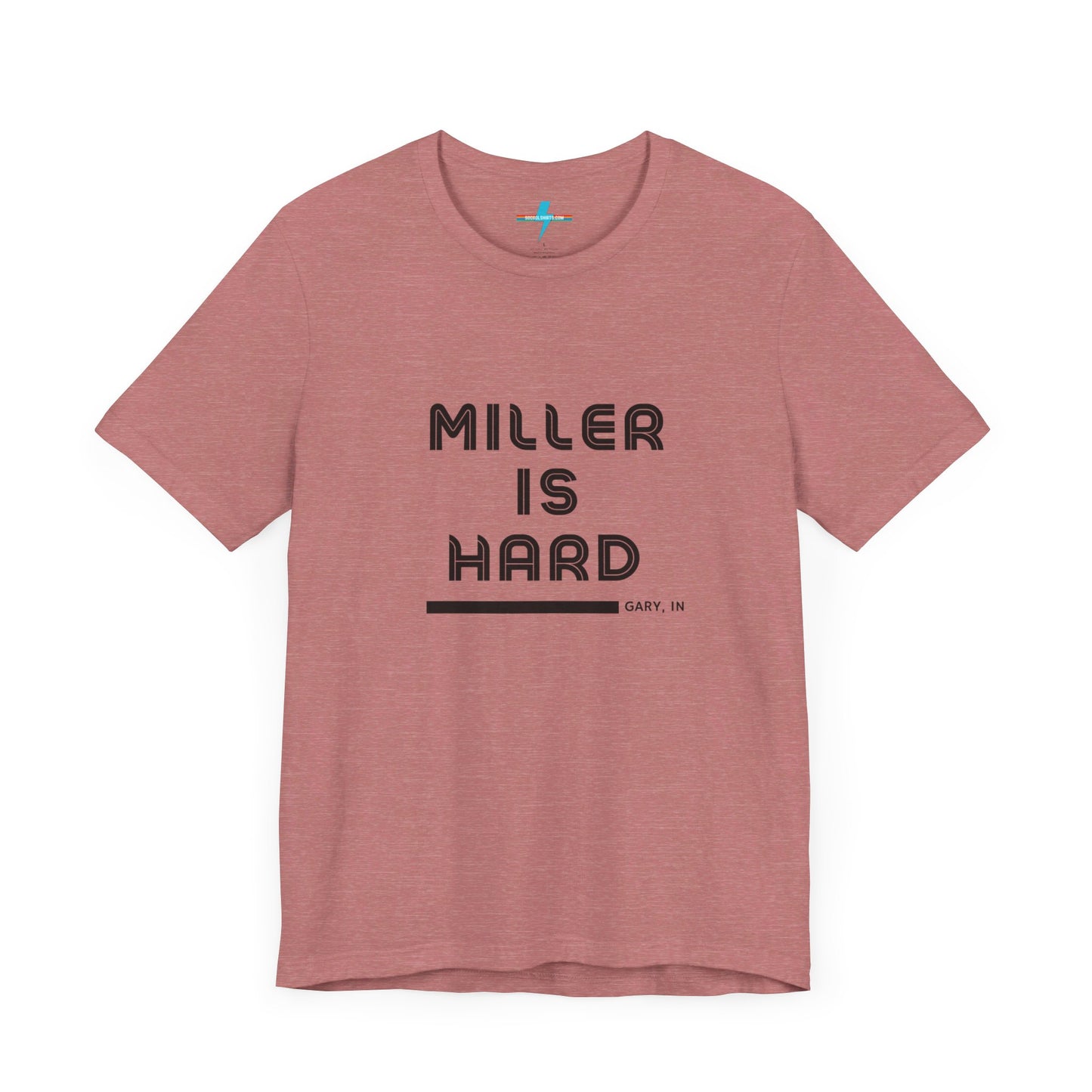 A unisex jersey short sleeve tee from Printify in burnt orange features the bold black text "MILLER IS HARD" on the chest, with "GARY, IN" written beneath in smaller black font. Perfect for showcasing Miller Beach's iconic spirit, this t-shirt is displayed against a plain white background.