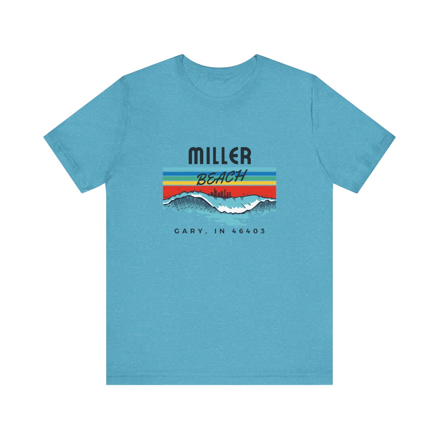 The Miller Beach 46403 Surf Style - Unisex Jersey Short Sleeve Tee by Printify features a retro surf-inspired design on a yellow background. The shirt displays "MILLER BEACH" above waves with a skyline illustration, while "Cary, IN 46403" is printed below the waves. The vibrant design also includes colorful stripes in shades of blue, red, and orange.