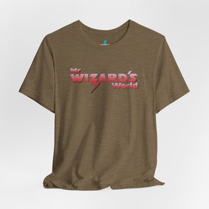 A purple Mr. Wizard's World T-shirt from Printify, featuring bold gradient red and white text with a lightning bolt through the letter "A" in "Wizard." Ideal for science enthusiasts and fans of the iconic 1980s Nickelodeon show, this unisex jersey short sleeve tee is displayed against a plain white background.