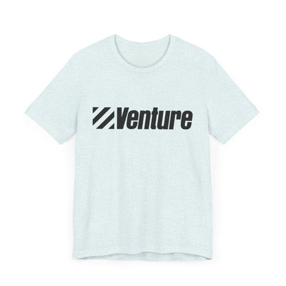 A unisex jersey short sleeve tee from Printify, featuring a classic 1980s Venture Stores logo printed in bold black letters across the chest on a gray fabric, is showcased against a plain white background.