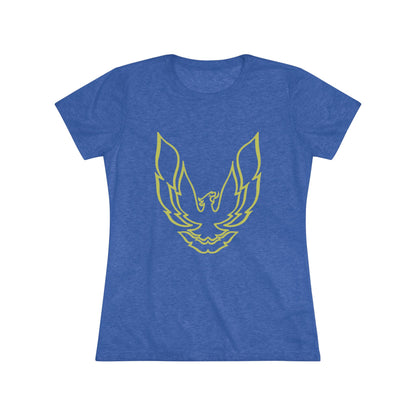 A retro 1970's-inspired red women's triblend tee by Printify, featuring a stylish gold phoenix design on the front. The vibrant, sleek graphic depicts the iconic Trans Am bird with its wings spread upward, giving this cozy t-shirt a bold and dynamic look.