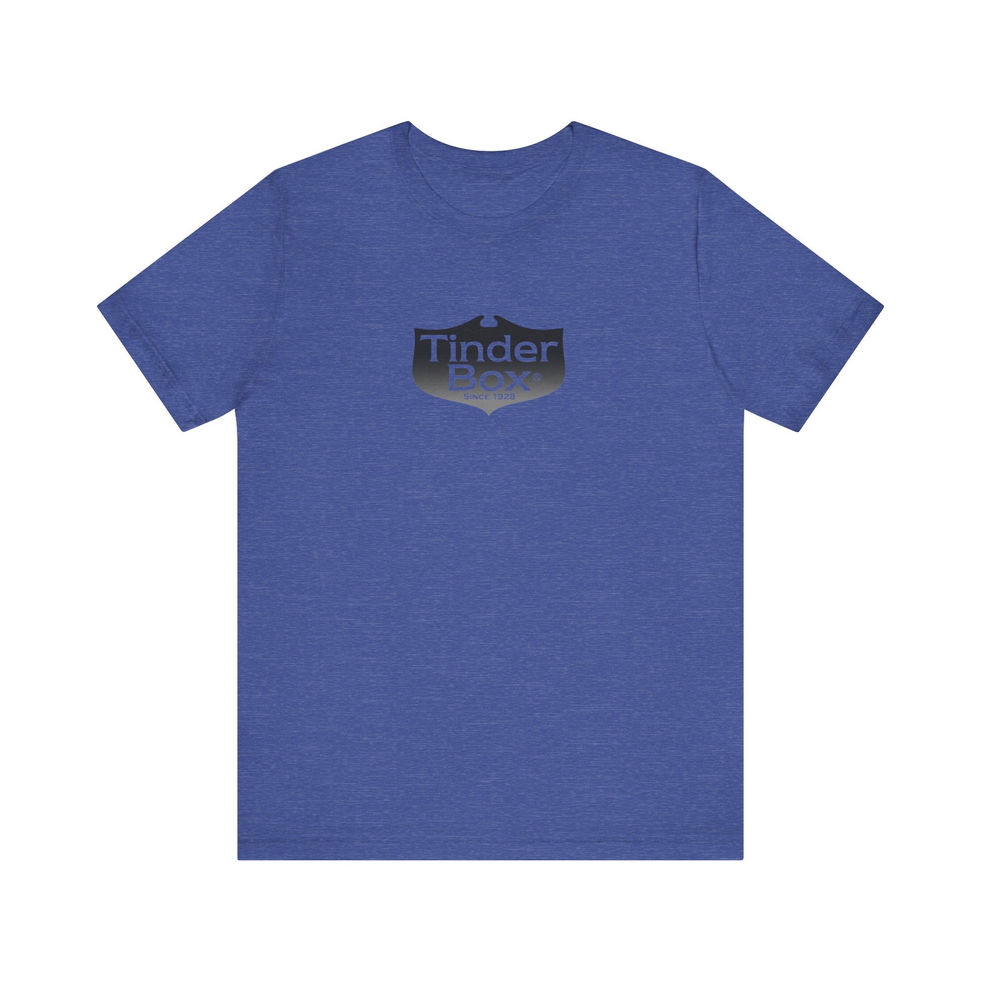 A light blue Printify "The Tinder Box 1980s" unisex jersey short sleeve tee featuring the "Tinder Box" logo in the center. The logo consists of a dark shield with the words "Tinder Box" in white text, with a small flame icon replacing the dot above the "i".