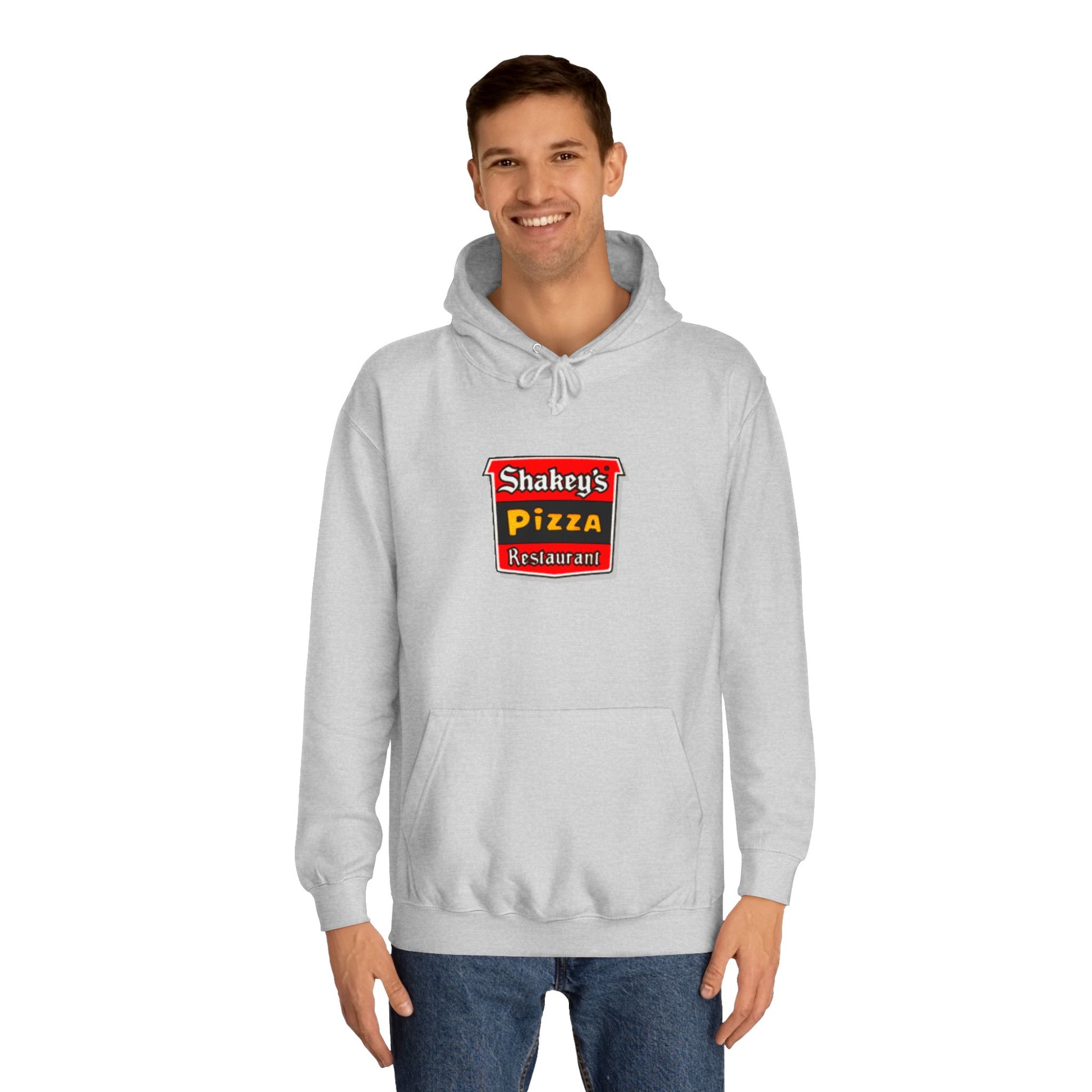 The Shakey's Pizza - 1980s Retro - Unisex Hoodie by Printify showcases a retro-style colorful logo on the front, highlighted with "Shakey's Pizza Restaurant" in bold white lettering against a striking red and black background, offering a vintage feel.