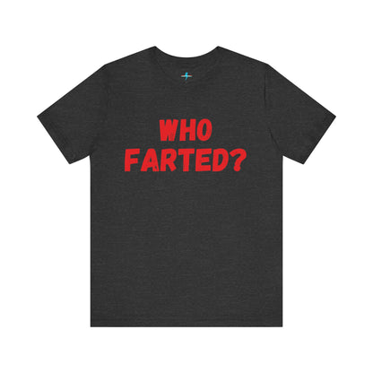 A white unisex jersey short sleeve tee from Printify featuring bold red text in the center that reads "WHO FARTED?". The distressed font style gives the text a touch of 80s comedy, inspired by the iconic 'Who Farted? Booger’ tee from Revenge of the Nerds.