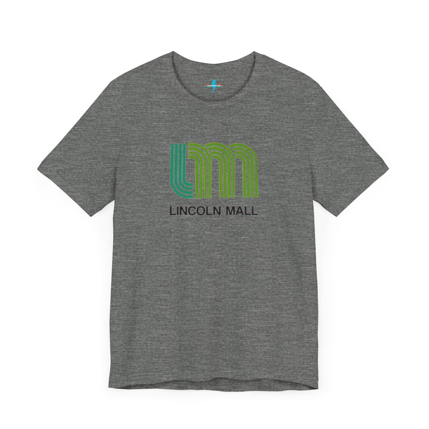 A light green unisex jersey short sleeve tee by Printify features "LINCOLN MALL" written under a retro-styled green and blue curved line design, celebrating the 70s and 80s shopping era in Lincoln Mall Matteson.