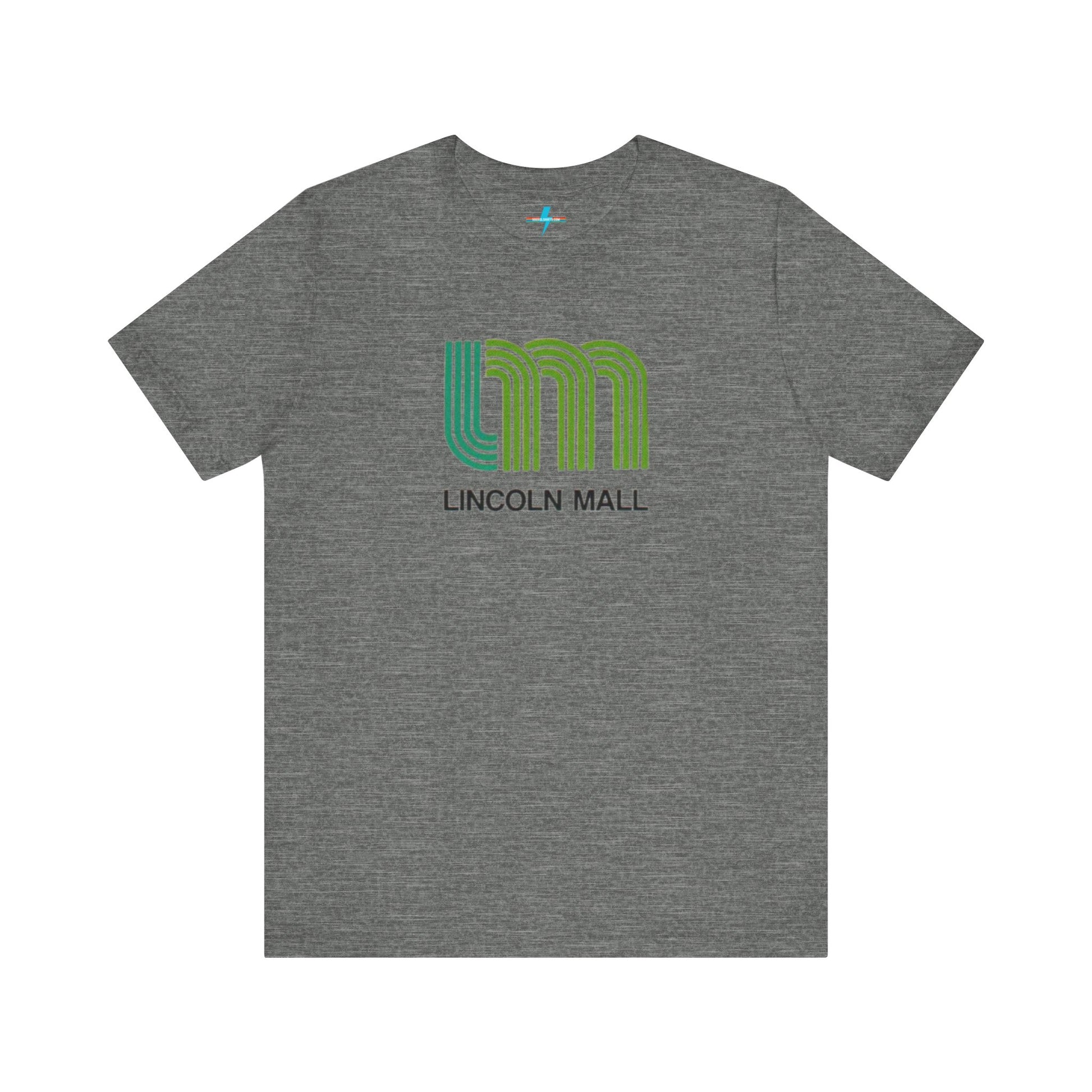 A light green unisex jersey short sleeve tee by Printify features "LINCOLN MALL" written under a retro-styled green and blue curved line design, celebrating the 70s and 80s shopping era in Lincoln Mall Matteson.