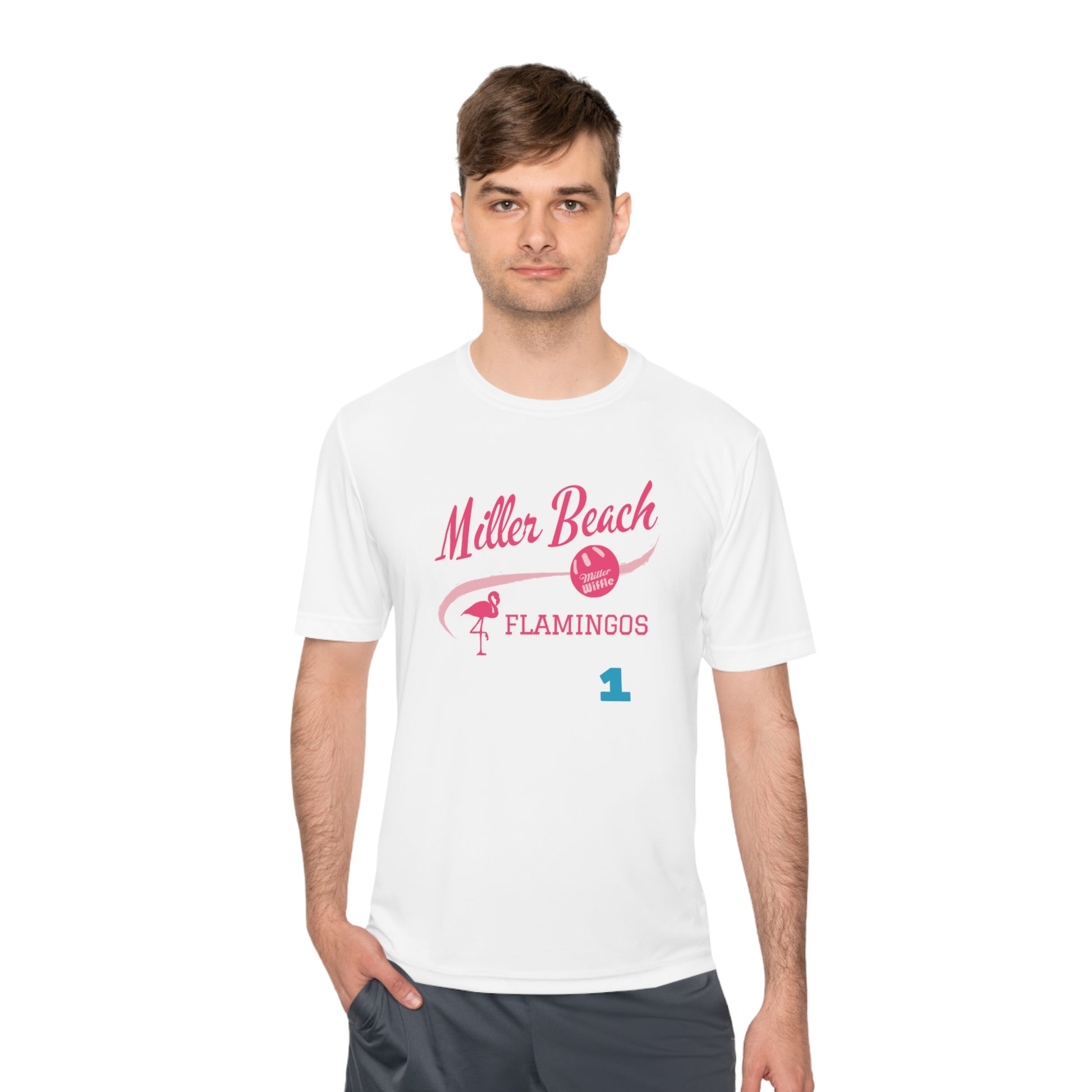 Introducing the "Miller Beach Flamingos - Jackson 01" Unisex Moisture Wicking Tee by Printify. This beige T-shirt showcases "Miller Beach" in a pink cursive font accompanied by a small pink flamingo illustration. Below, "FLAMINGOS" is displayed in bold pink capital letters, with a blue "01" on the bottom right corner. As part of the Sport-Tek PosiCharge Competitor collection, this lightweight shirt provides superior moisture-wicking performance.