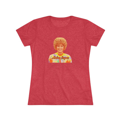 A Women's Triblend Tee by Printify, titled "Helen Roper - Three's Company," features a red design with an illustration of a smiling person with curly hair and colorful clothing. Below the illustration, the text "Helen Roper" is written in a bold, retro font, capturing the essence of vintage TV humor.