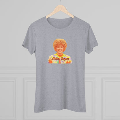 A Women's Triblend Tee by Printify, titled "Helen Roper - Three's Company," features a red design with an illustration of a smiling person with curly hair and colorful clothing. Below the illustration, the text "Helen Roper" is written in a bold, retro font, capturing the essence of vintage TV humor.