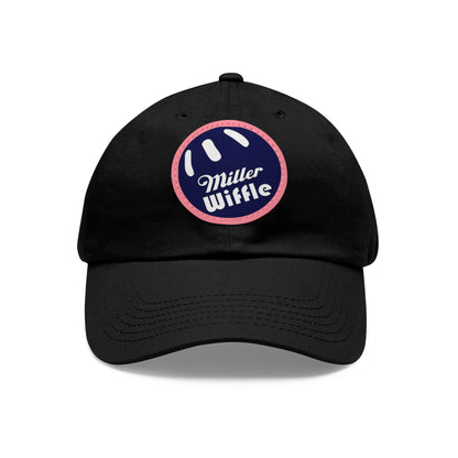 A gray dad hat by Printify, crafted from bio-washed chino twill, featuring a circular blue and white leather patch on the front. The patch showcases a baseball design with "Miller Wiffle" written in cursive font.