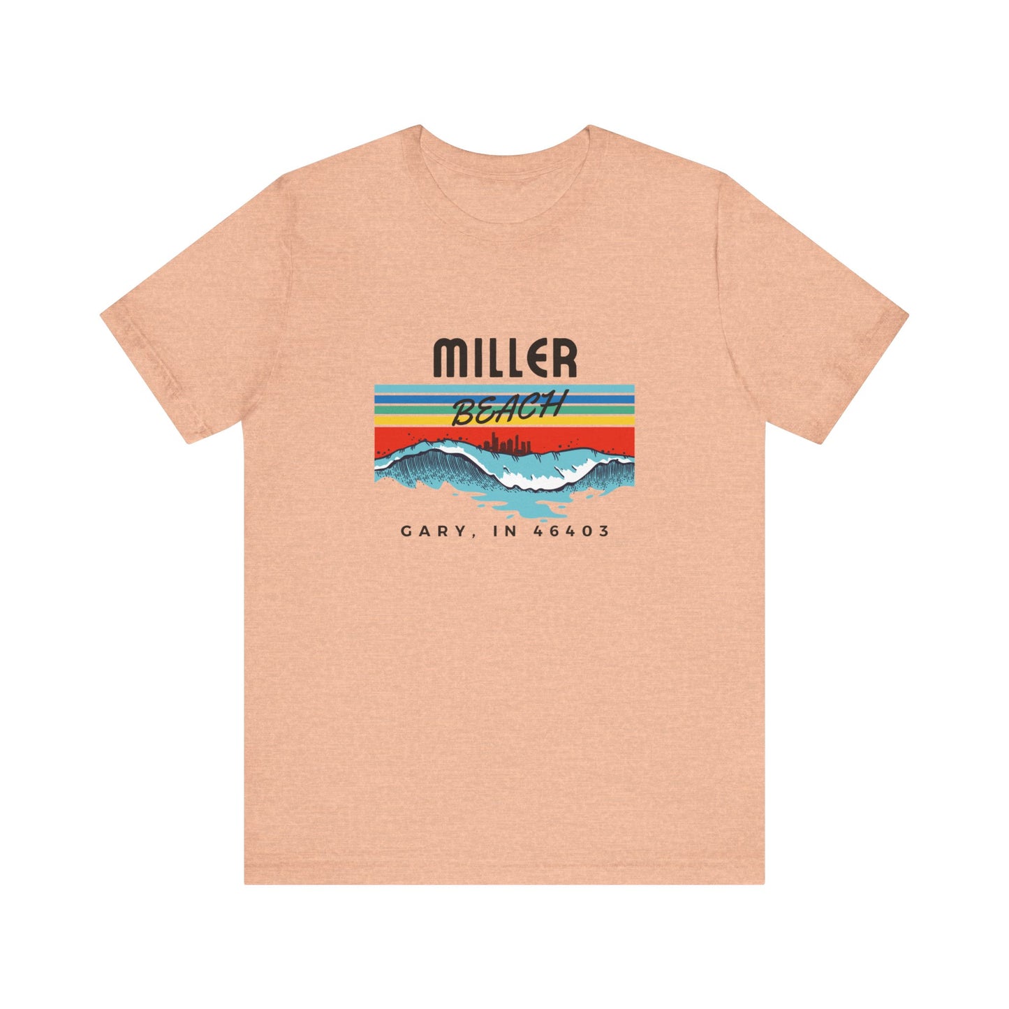 The Miller Beach 46403 Surf Style - Unisex Jersey Short Sleeve Tee by Printify features a retro surf-inspired design on a yellow background. The shirt displays "MILLER BEACH" above waves with a skyline illustration, while "Cary, IN 46403" is printed below the waves. The vibrant design also includes colorful stripes in shades of blue, red, and orange.