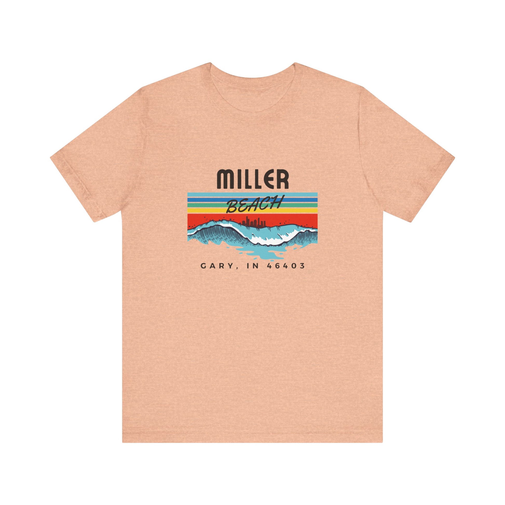 The Miller Beach 46403 Surf Style - Unisex Jersey Short Sleeve Tee by Printify features a retro surf-inspired design on a yellow background. The shirt displays "MILLER BEACH" above waves with a skyline illustration, while "Cary, IN 46403" is printed below the waves. The vibrant design also includes colorful stripes in shades of blue, red, and orange.