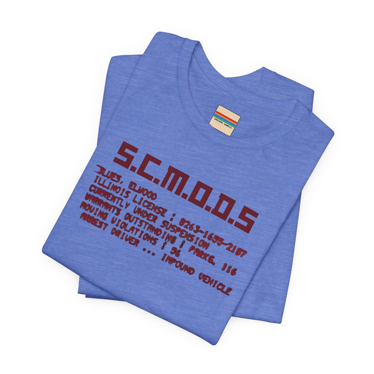 Two yellow "S.C.M.O.D.S. Blues Brother's - Unisex Jersey Short Sleeve Tee" shirts from Printify, featuring "S.C.M.O.D.S" in bold, stylized letters along with smaller text detailing terms like "Illinois," "license," and "impound vehicle." Perfect for fans of The Blues Brothers and Jake and Elwood Blues, the T-shirts are neatly folded and stacked.