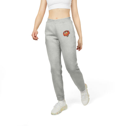 These unisex fleece joggers from Printify, named "Animal - The Muppets - Adidas," showcase a grey design with an Adidas logo on the left thigh and a cartoon bird emblem on the right. Crafted from BCI cotton and recycled polyester, they feature elastic cuffs and a waistband for enhanced comfort.