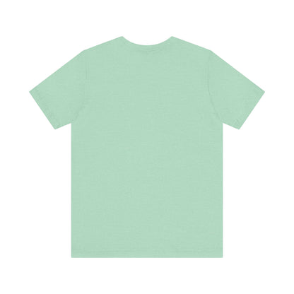 A light green unisex jersey short sleeve tee by Printify features "LINCOLN MALL" written under a retro-styled green and blue curved line design, celebrating the 70s and 80s shopping era in Lincoln Mall Matteson.