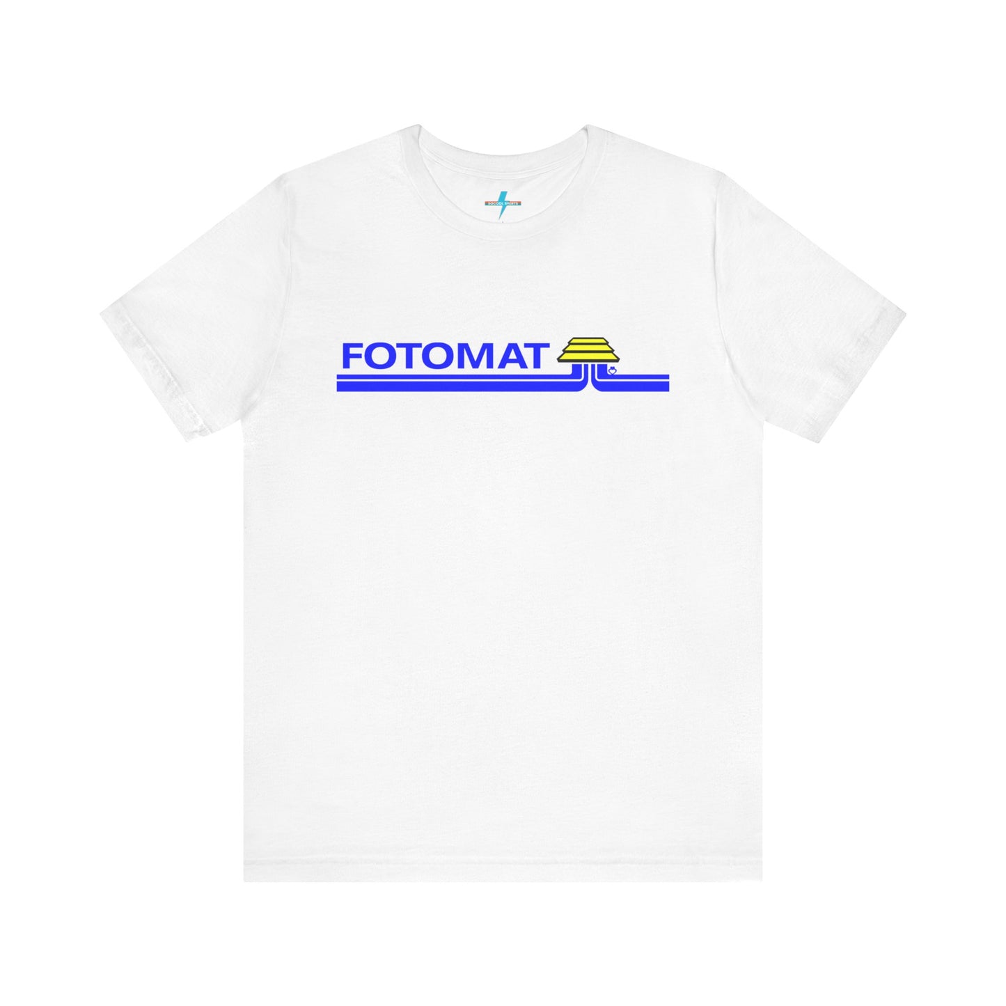 The Fotomat 1970s Retro T-Shirt by Printify is a dark gray short-sleeve shirt that features the word "FOTOMAT" in bold blue capital letters and a blue and yellow graphic design resembling layered lines and an upside-down triangle. This Tshirt captures the essence of 80s nostalgia with its centered, retro design.