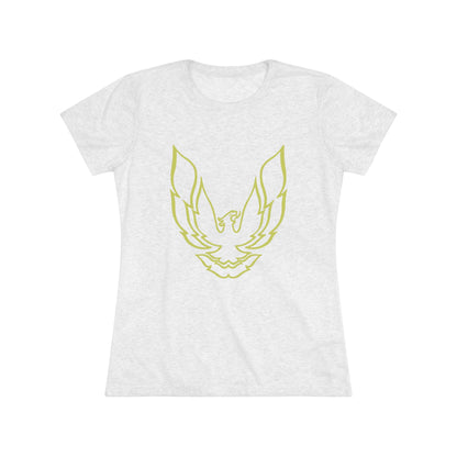 A retro 1970's-inspired red women's triblend tee by Printify, featuring a stylish gold phoenix design on the front. The vibrant, sleek graphic depicts the iconic Trans Am bird with its wings spread upward, giving this cozy t-shirt a bold and dynamic look.